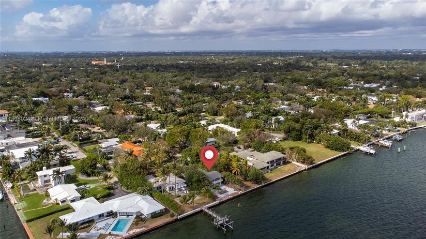 Introducing a once-in-a-lifetime opportunity to own a waterfront property in this highly coveted area, boasting breathtaking panoramic views of the bay. Is now available, whether you choose to purchase it as-is  at $3,900,000 or embark on a new project at $5.500,000 (new pics,redenrings and  a full details renovation coming soon)

Nestled on a serene, secluded street, this remarkable home features 5 generously sized bedrooms and 4 full bathrooms, including a luxurious private master suite on the second floor. The residence is thoughtfully designed, offering ample space, a convenient 2-car garage, laundry room and a Private Dock
