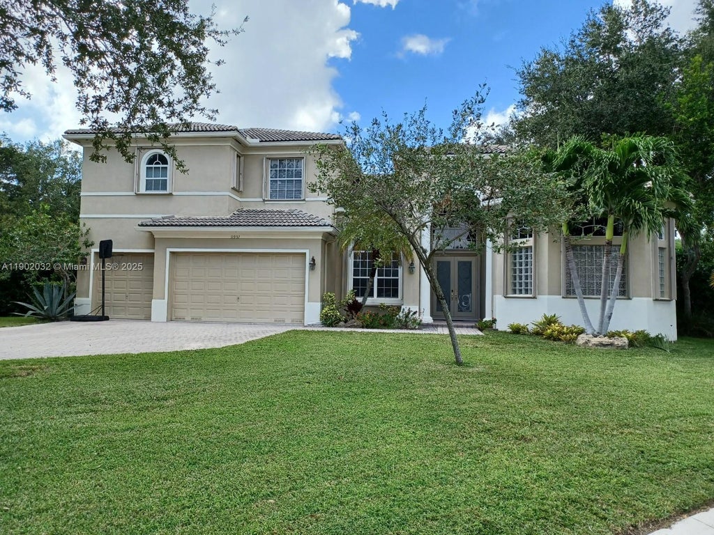 Photo of 11937 NW 11th Ct, Coral Springs, FL 33071 (MLS # A11902032)