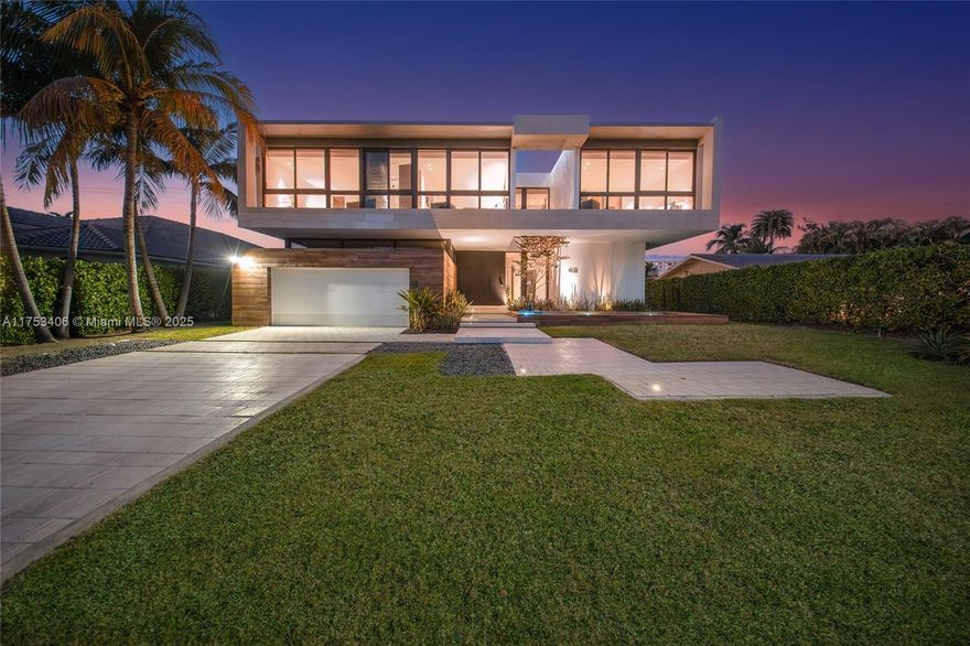 Located in the guard-gated Golden Isles community, this exceptional 2-story waterfront estate commands 85 ft of prime yacht-friendly water frontage. Boasting 6 bedrooms and 6 bathrooms, the home features soaring 24-ft ceilings throughout the entrance and living areas, creating an open, elegant atmosphere. A private elevator ensures effortless access between levels, while the chef’s kitchen and wine fridge set the stage for sophisticated entertaining. Natural light pours in through the skylight roof, enhancing the home’s airy feel, while the luxury pool and jacuzzi provide a tranquil retreat. With direct access to the bay and ocean, each evening offers a captivating, front-row view of the sunset. Experience the pinnacle of waterfront luxury living in this extraordinary estate. Call today!