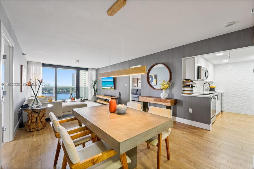 Live the waterfront lifestyle NOW! Fully furnished and move-in ready, this modern 2 bed, 2 bath condo features CRATE & BARREL furniture, custom wallpaper, Samsung appliances and hurricane Impact Doors. It offers canal and ocean views, a prime waterfront location across from a beautiful golf course. A stylish home that delivers comfort, convenience and a standout lifestyle. The building recently installed two electric vehicle charging stations, washer and dryer inside the unit. Rare opportunity, Don't miss this unit !!