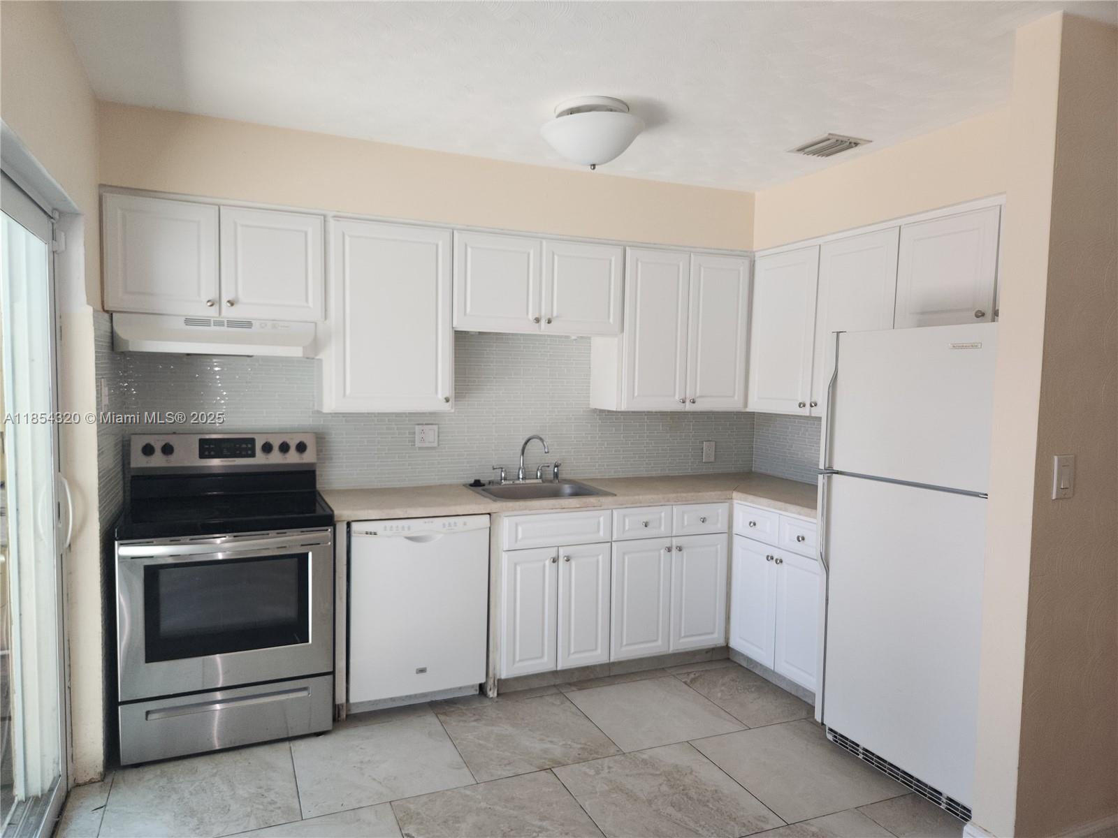 212 SW 13th St
