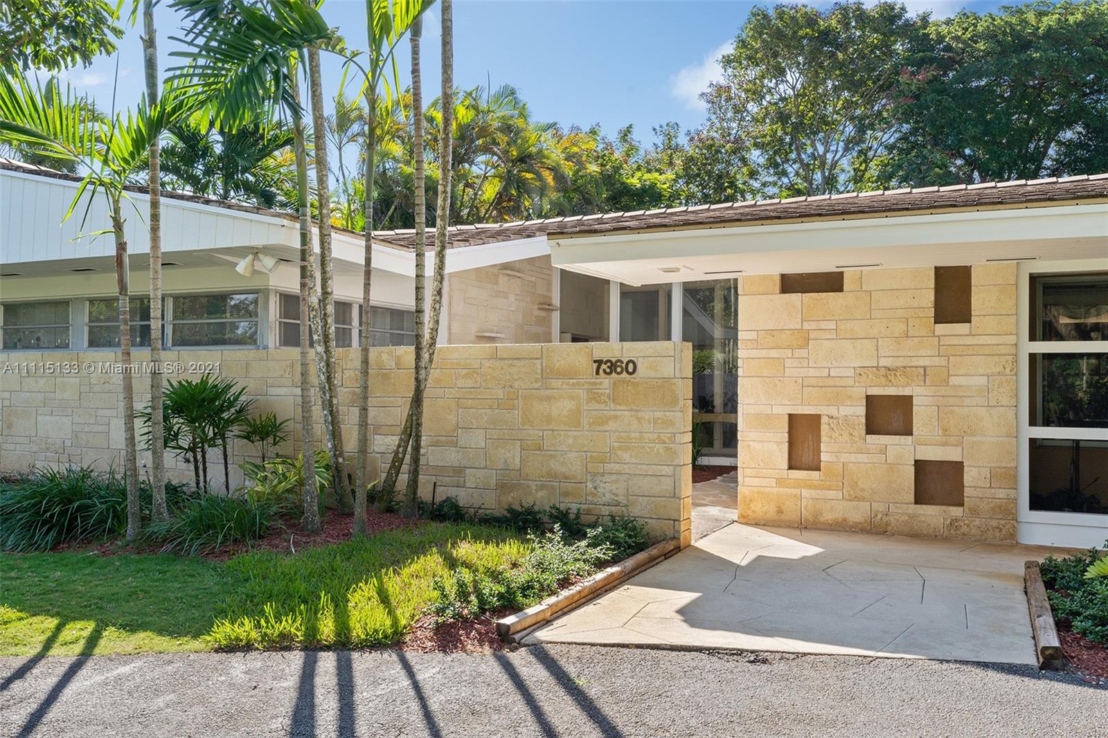 Paradise Found! Spectacular one of a kind Pinecrest home built by premier builder Marvin Hollub in 1960 as his own personal residence. This tropical single story estate merges indoor outdoor living that create light filled open spaces. With over 4500 adj sq ft. this home features a split floor plan with 4 spacious bed, 3 bath and an amazing pool/patio area with deep overhang that can accommodate large gatherings. Additional areas include, fabulous great room, formal dining room off the kitchen, an indoor gym and plenty of storage. The common areas have large sliding glass doors that offer stunning views of the expansive grounds and open up to your own private oasis. Plenty of parking with an oversized side entry 2 car garage and circular driveway. The list goes on and on! A must see!