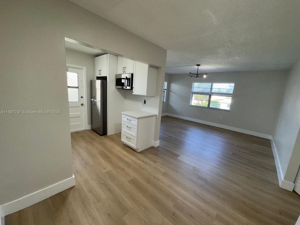 Photo of 1720 Cleveland St #201E, Hollywood, FL 33020 (MLS # A11697797)