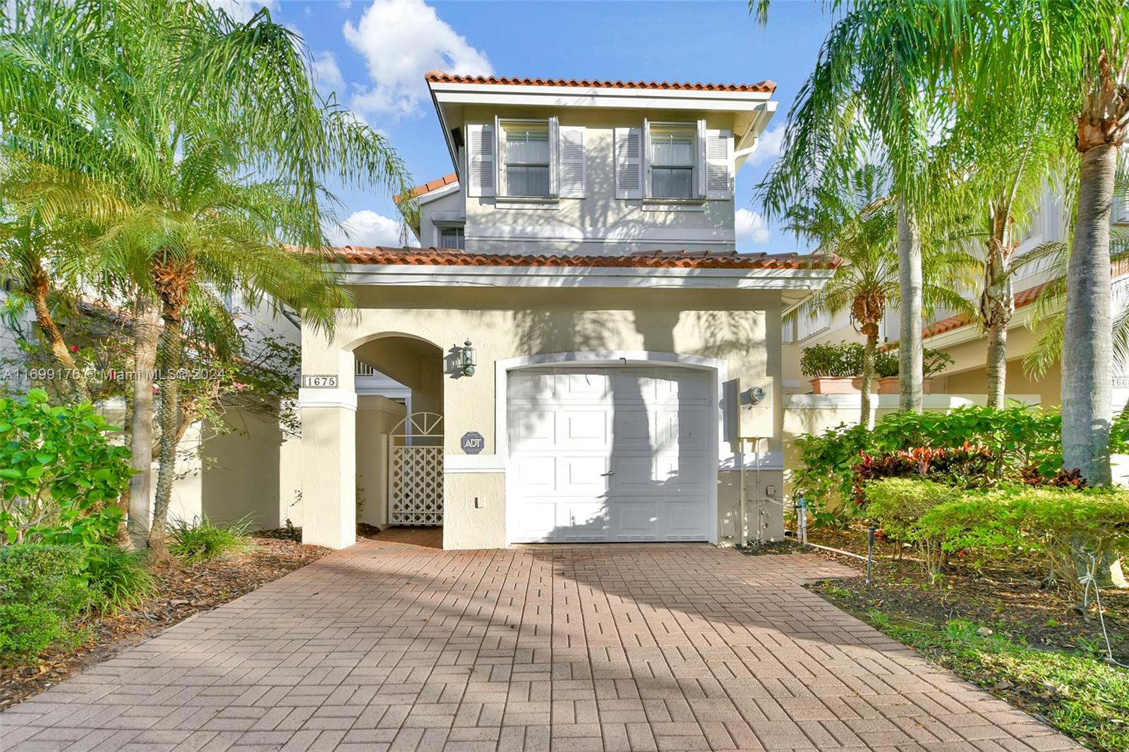 AMAZING 3/2.5 IN WEST LAKE VILLAGE WITH 1 CAR GARAGE. STAINLESS STEEL APPLIANCES, LOVELY COURTYARD TO ENTERTAIN WITH ACCESS FROM KITCHEN AND LIVING ROOM AREAS. DRIVEWAY FITS 3 CARS. HUGE MASTERBEDROOM WITH WALK IN CLOSET, GUEST BEDROOM WITH PRIVATE BALCONY. ACCORDION HURRICANE SHUTTERS.GUARD GATE 24/7 LOCATED 1 MILE FROM BEACH. GREAT AMMENITIES: HEATED POOL, 2TENNIS COURT, GYM, CLUBHOUSE, BASKETBALL AND KIDS PLAYGROUD.