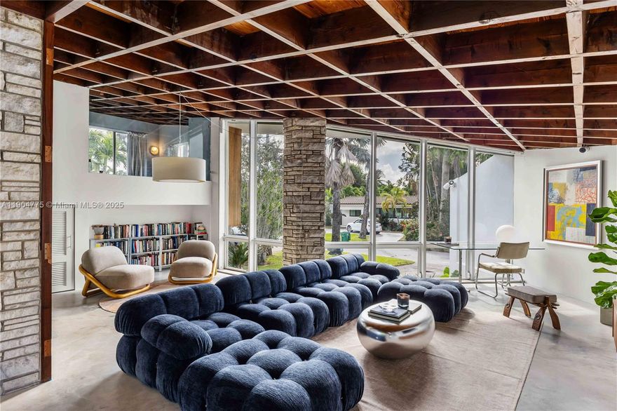 A true architectural masterpiece in the heart of Shorecrest, this distinctive Mid-Century Modern residence designed by Architect George Jiri Hladik has been thoughtfully renovated while preserving its timeless character. Signature design details include vaulted wood-beamed ceilings, floor-to-ceiling glass, and an open split-level layout that blends natural light and space with effortless flow. Perfect for both relaxing and entertaining, the home’s interiors open to a lush tropical backyard oasis surrounded by mature landscaping for ultimate privacy. Modern upgrades include a newer roof (2020), impact doors, and a tankless water heater. A rare opportunity to own an architectural gem that lives like a piece of art.