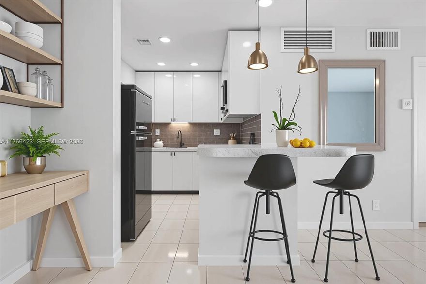 Experience modern living in this fully remodeled 1-bedroom, 1-bathroom apartment in the gated River Shores community. This first-floor unit features a stunning new kitchen with Italian cabinetry, brand-new appliances, and a unique Black Retro refrigerator. Enjoy a bright, open layout designed for comfort and style. River Shores offers resort-style amenities, including a riverfront pool, tennis courts, a gym, and boat docks available on a first-come, first-serve basis (subject to HOA availability). Conveniently located near shopping, dining, and major highways, this home provides easy access to downtown Fort Lauderdale and the beach. A perfect opportunity for those seeking a stylish, move-in-ready home in a prime location. Schedule your showing today!