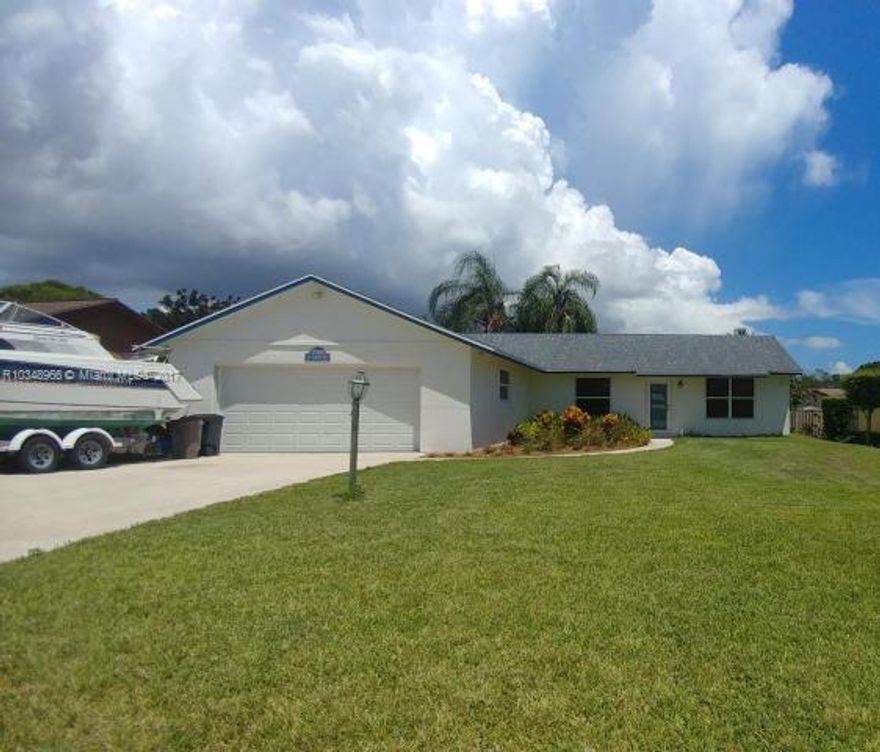 Wonderful move-in ready, well maintained, easy single-story Hobe Sound home with NO HOA.  ALL Windows, Doors, Garage Doors are Cat-3 Hurricane Impact.  Hurricane Locks on front and french doors. Vaulted Ceilings. Attached garage, fenced in backyard with patio.  French Doors in Master and sliders in Family room open to patio.  Lots of room, light and yard! Pre-qualified buyer showings only.