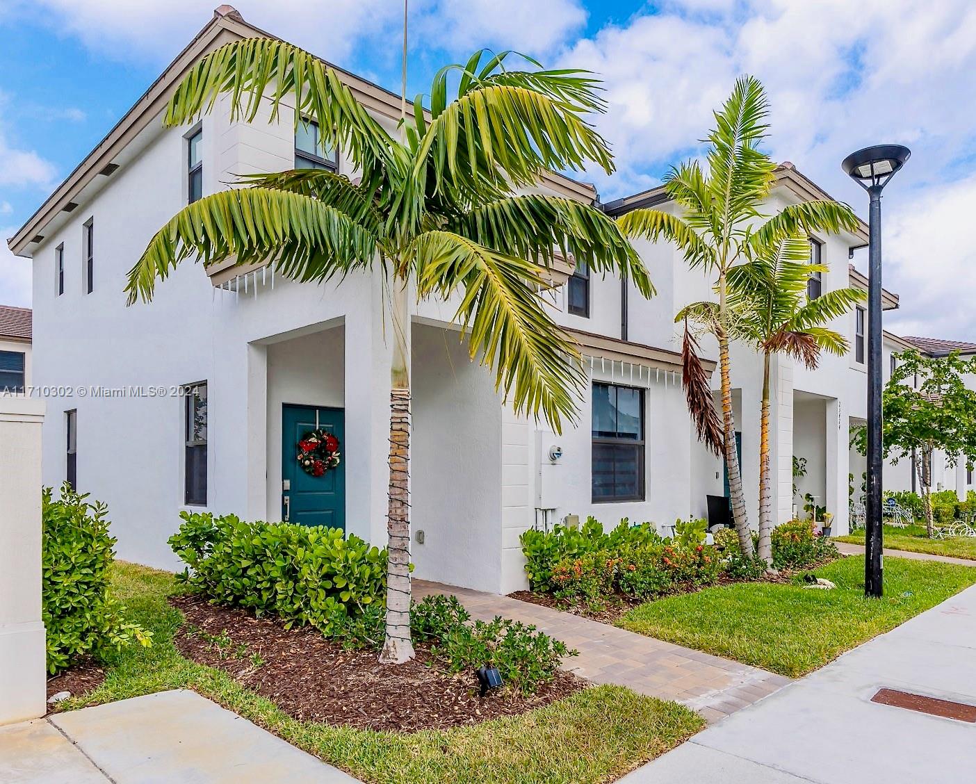 This newly constructed 3-bedroom, 3-bathroom townhome offers upgrades unmatched by any other unit in the community. The open floor plan flows seamlessly into a modern kitchen with brand-new appliances and ample counter space. Highlights include custom built-in closets, updated light fixtures, custom window blinds, and durable tile and laminate flooring throughout. Both upper-level bedrooms feature en-suite bathrooms for added convenience. Step outside to a private, tiled, and covered patio, perfect for relaxing or entertaining. Conveniently located near major highways, parks, shopping, and top-rated schools, this move-in-ready home is a rare find. The current owner spared no expense in upgrades—don’t miss this opportunity!