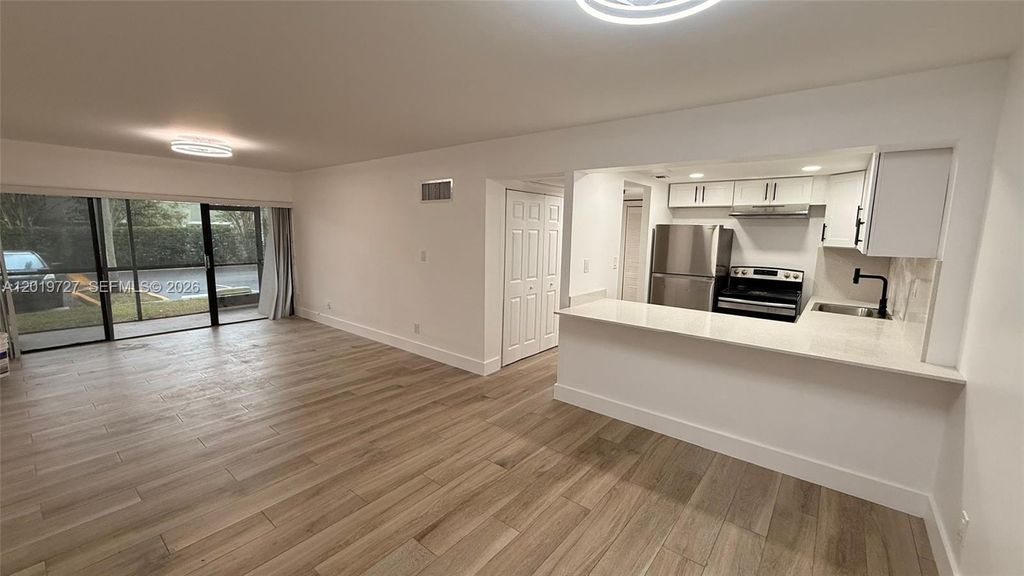 Photo of 5845 Washington St #65, Hollywood, FL 33023 (MLS # A12019727)