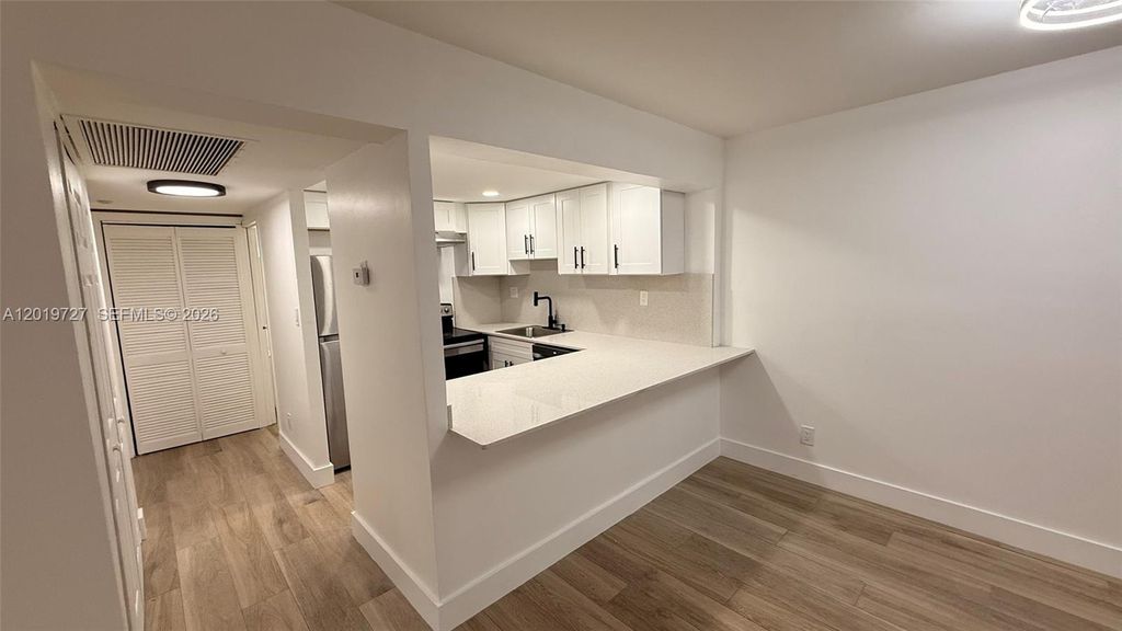 Photo of 5845 Washington St #65, Hollywood, FL 33023 (MLS # A12019727)
