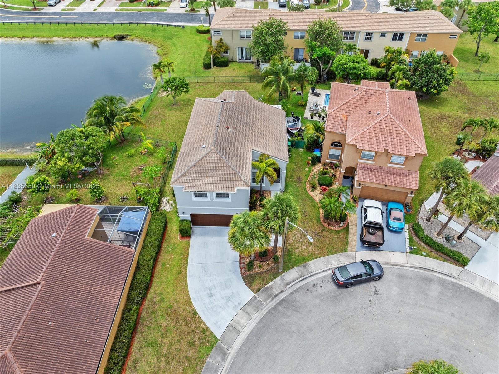 Feel the excitement of arriving in Towngate’s friendly streets, where neighbors become friends and A-rated schools are steps away. This spacious 4-bedroom, 2½-bath gem sits on an oversized waterfront lot at the end of a cul-de-sac and boasts a new AC alongside more than $50,000 in newly installed impact windows and doors—peace of mind built in. Step out onto your lakeside patio, where mornings shine over tranquil water and evenings glow beneath pastel skies. Imagine birthday parties on the lush lawn, weekend barbecues, and future expansions like a pool or dock. Inside, sunlit living areas flow into a chef-ready kitchen, perfect for school-night dinners and holiday feasts. With quick access to parks, Pembroke Lakes Mall, and West Fork Town Center, your family’s next chapter begins here.