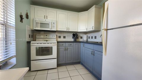 Photo of 5750 NW 64th Ave #208, Tamarac, FL 33319 (MLS # A11981040)