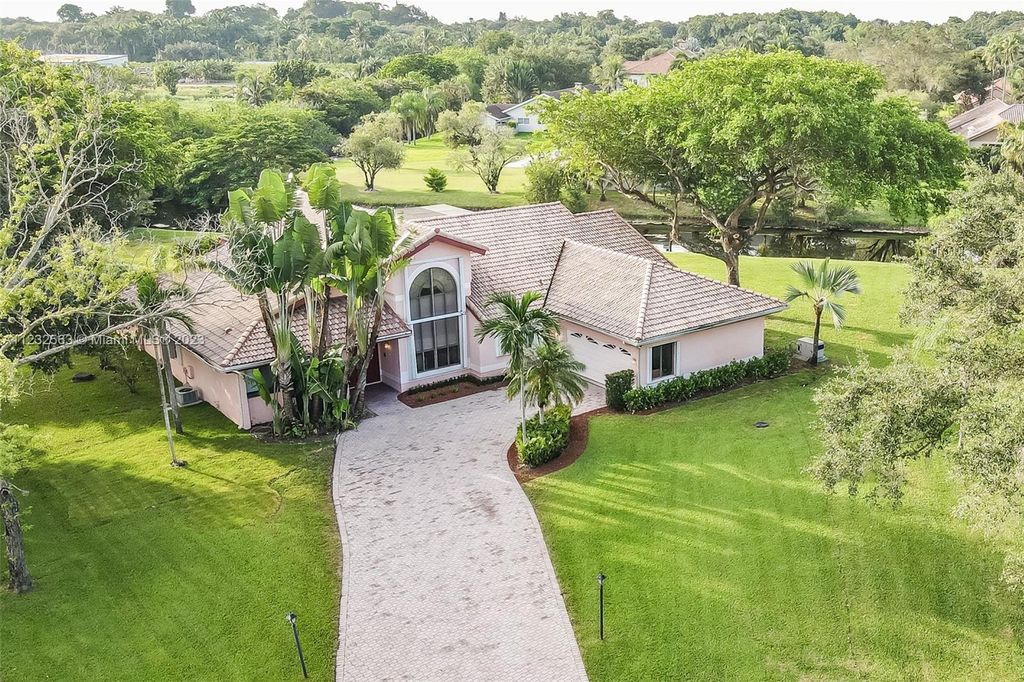 Photo of 11939 Acorn Dr, Davie, FL 33330 (MLS # A11232563)