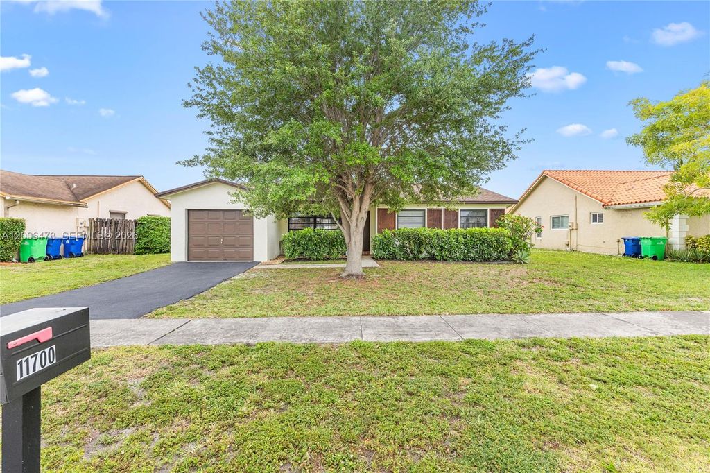 Photo of 11700 NW 41st St, Sunrise, FL 33323 (MLS # A12006478)