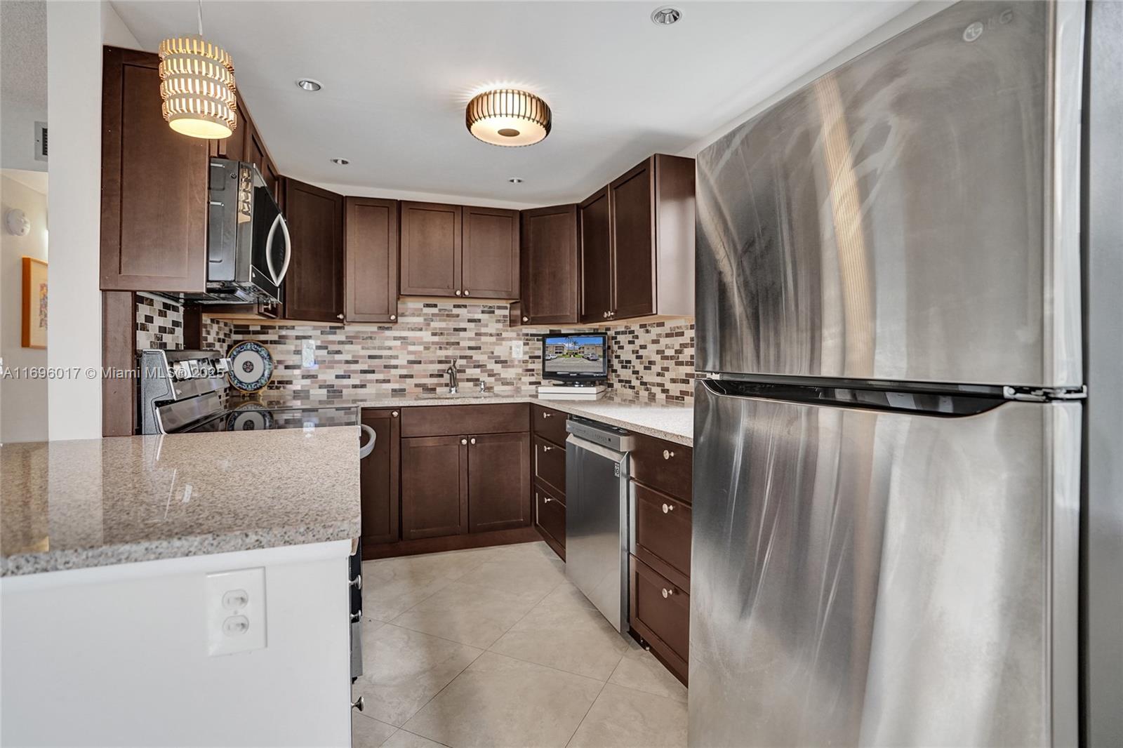 KINGS POINT BURGUNDY COND - Residential