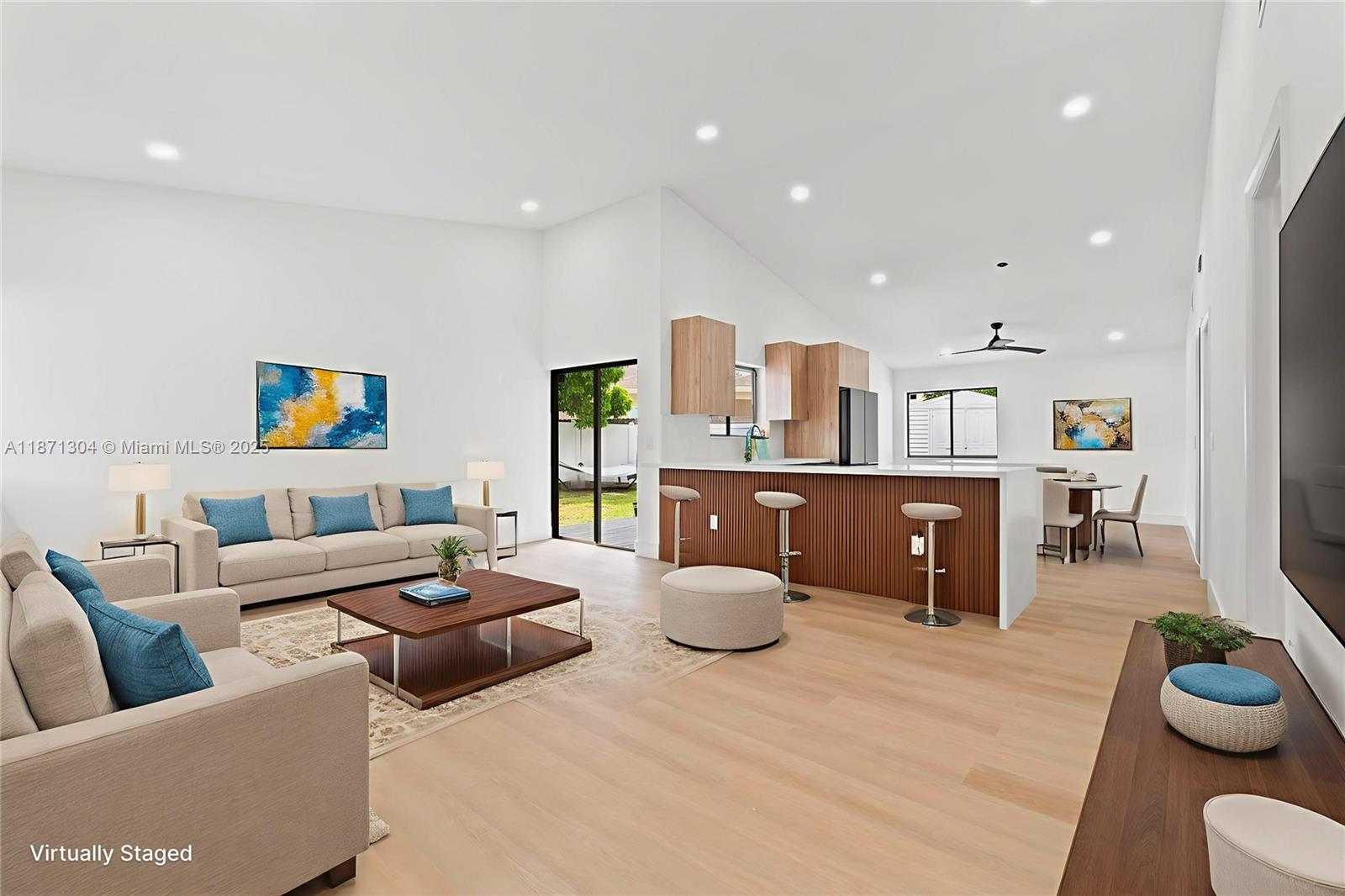 Discover this stunning Miramar home! This 3BR/2BA residence features modern design with open-concept layout maximizing natural light and sophisticated finishes. The kitchen boasts luxury appliances, warm wood cabinetry, and premium countertops - perfect for cooking and entertaining. Expansive outdoor living includes spacious patio, deck, and garden ideal for gatherings and relaxation. Standout feature: fully paid solar system providing energy efficiency and long-term savings. This move-in ready home combines style, comfort, and sustainability in a desirable neighborhood.