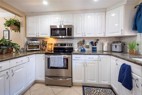 Photo of 9491 Evergreen Pl #302, Davie, FL 33324 (MLS # A12011749)