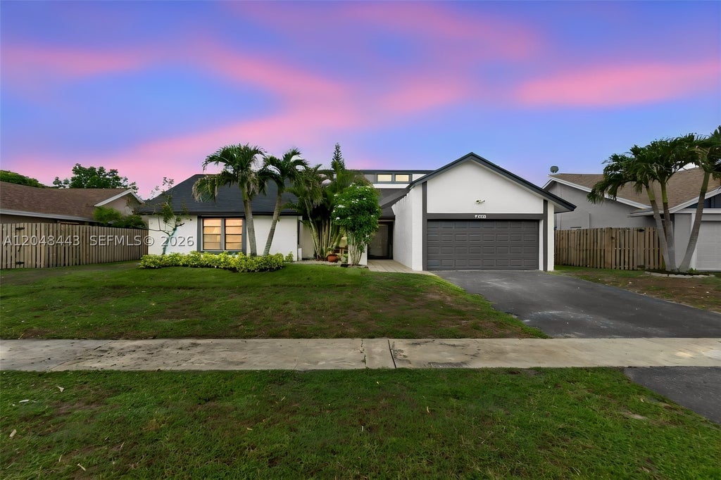 Photo of 7428 NW 49th Ct, Lauderhill, FL 33319 (MLS # A12048443)