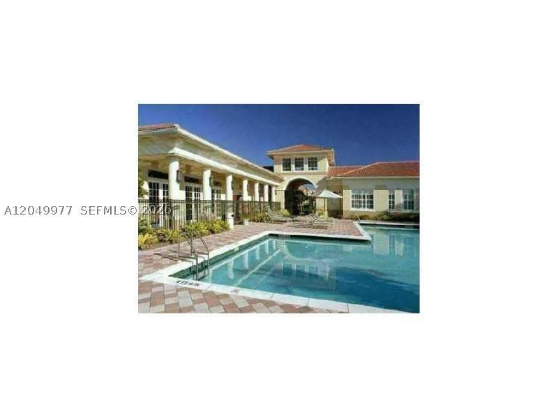 Photo of 2544 Centergate Dr #203, Miramar, FL 33025 (MLS # A12049977)