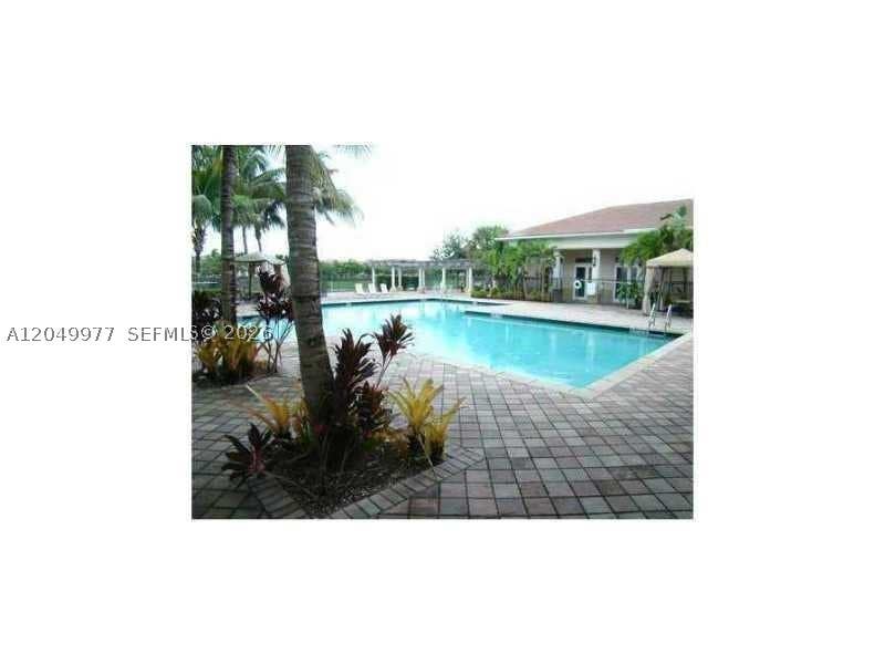 Photo of 2544 Centergate Dr #203, Miramar, FL 33025 (MLS # A12049977)
