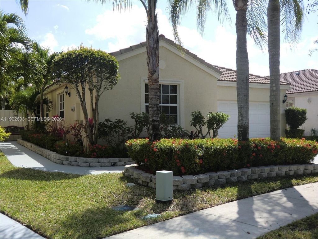 Photo of 1593 NW 158th Ave, Pembroke Pines, FL 33028 (MLS # A11992833)
