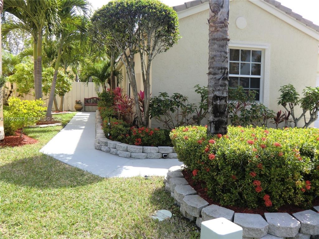 Photo of 1593 NW 158th Ave, Pembroke Pines, FL 33028 (MLS # A11992833)