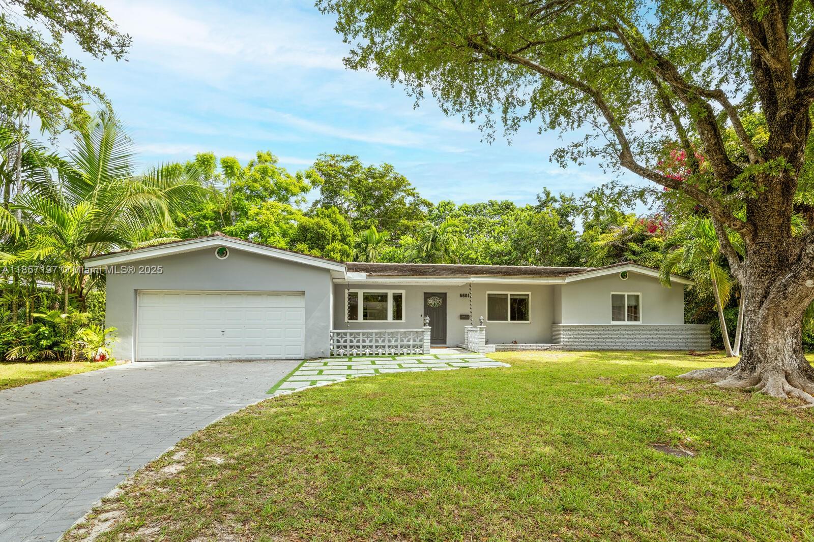 Located on a generous 10,105 sq ft lot in a charming, tree-lined pocket of South Miami, this property offers endless potential. The existing home features full impact windows as well as an updated kitchen and bathrooms. The rest of the home could benefit from some TLC, making it an ideal opportunity to renovate or start fresh with new construction. Surrounded by well-maintained homes and new development activity, the neighborhood continues to grow in appeal, offering excellent long-term value. Just minutes from top-rated schools, parks, shopping, and the heart of Coral Gables, this is a rare chance to create your ideal home in a sought-after location.