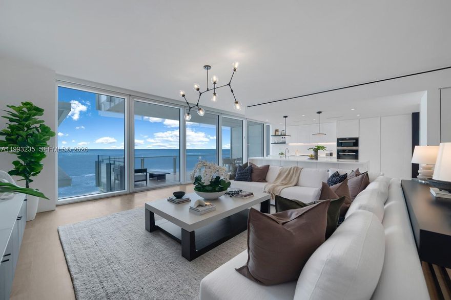 Welcome to an extraordinary high-floor retreat along Surfside's prestigious Billionaires Row. This rarely available flow-through residence spans 3,424 square feet with two bedrooms, a versatile media room, and two and a half baths. Over 600 square feet of terraces frame breathtaking ocean, bay, and sunset skyline panoramas. One of the only layouts to feature a large oceanfront open kitchen which includes a custom pantry and gas range, as well as a primary suite with oversized dual walk-in closets. A private air-conditioned garage adds an extra layer of exclusivity as this is one of the few that exist in the entire building, perfect for your exotic cars or extra storage. World-class amenities include Thomas Keller's Michelin-starred The Surf Club Restaurant, spa, pool and beach service, and private cabanas. World renowned shopping destination Bal Harbour Shops sit just steps away. Oceanfront living at its finest!