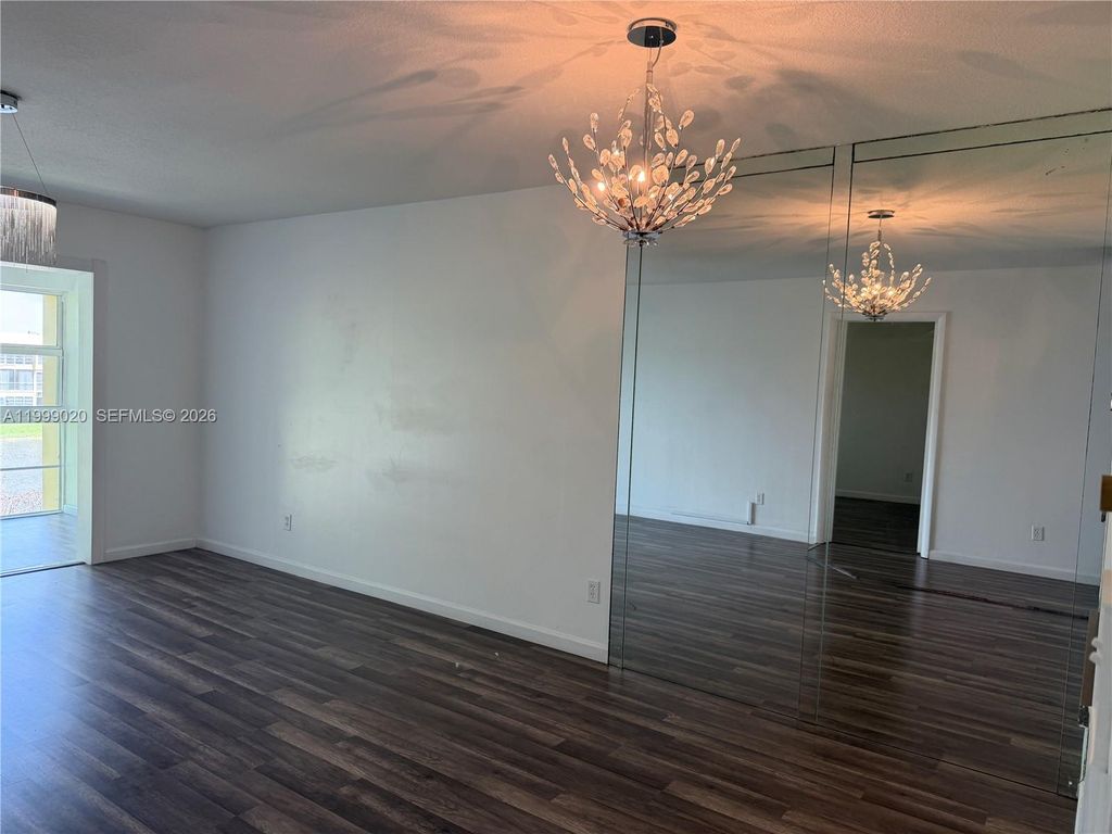 Photo of 5851 NW 62nd Ave #305, Tamarac, FL 33319 (MLS # A11999020)