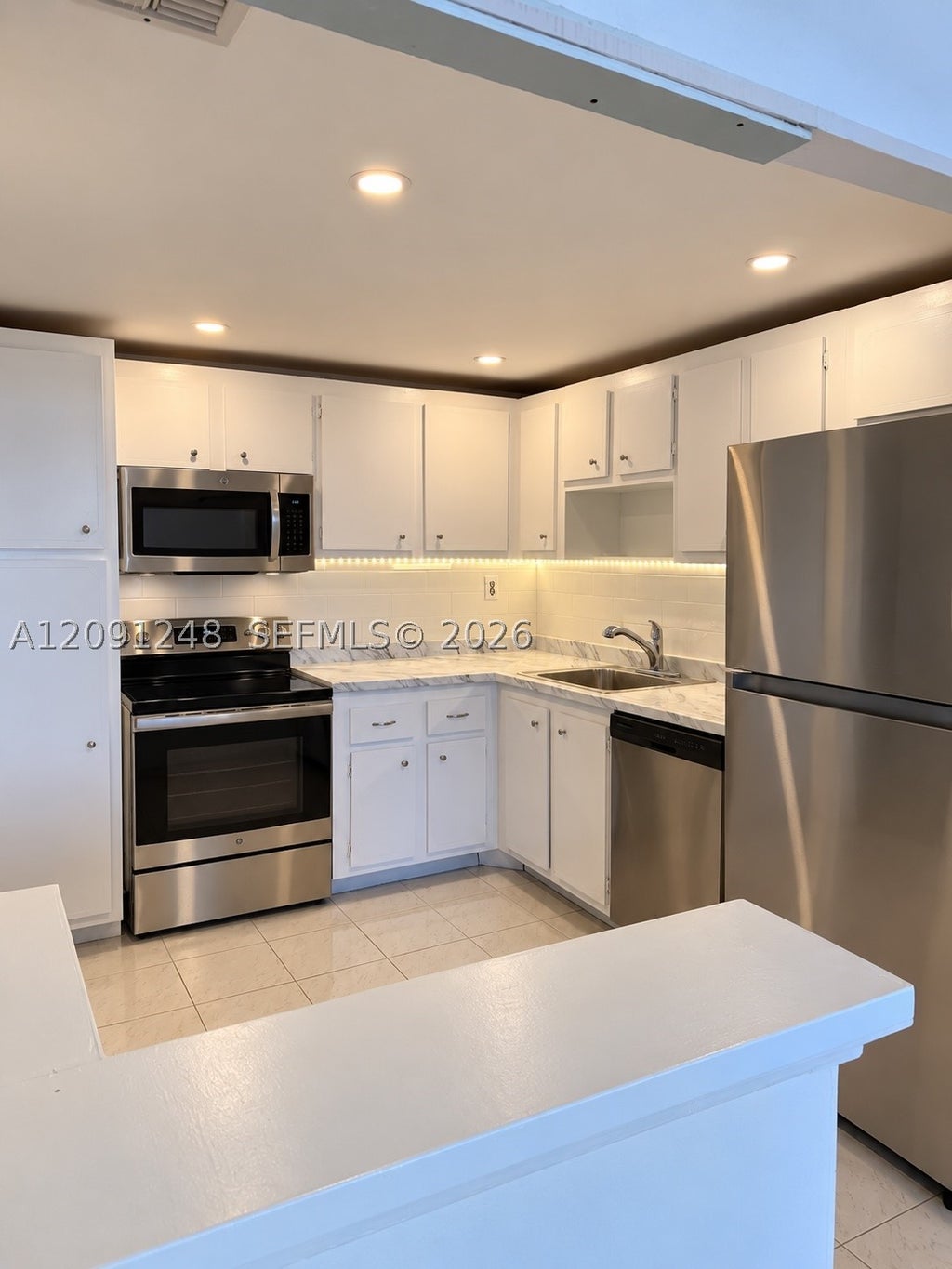 Photo of 2761 Taft St #212, Hollywood, FL 33020 (MLS # A12091248)
