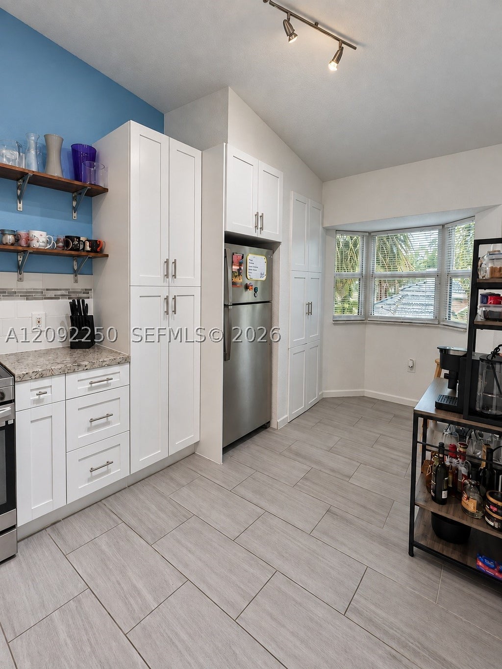 Photo of 7760 NW 22nd St #205, Pembroke Pines, FL 33024 (MLS # A12092250)