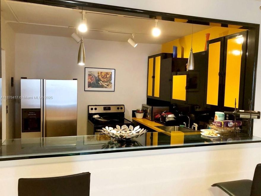 Discover resort style living in Hallandale Beach with this inviting 1-bedroom, 1.5-bathroom condo. Covering 1,000 sq ft, this furnished home features an open kitchen and spacious living area. Enjoy amenities such as a heated pool, spa, gym, yoga studio, and more. Security includes a gated entrance, concierge, and doorman. Additional conveniences: assigned parking, valet, and private storage.

Located just 10 minutes from the beach, this condo offers a convenient location near major shopping plazas and easy access to the highway. Schedule your viewing today to experience this welcoming property!