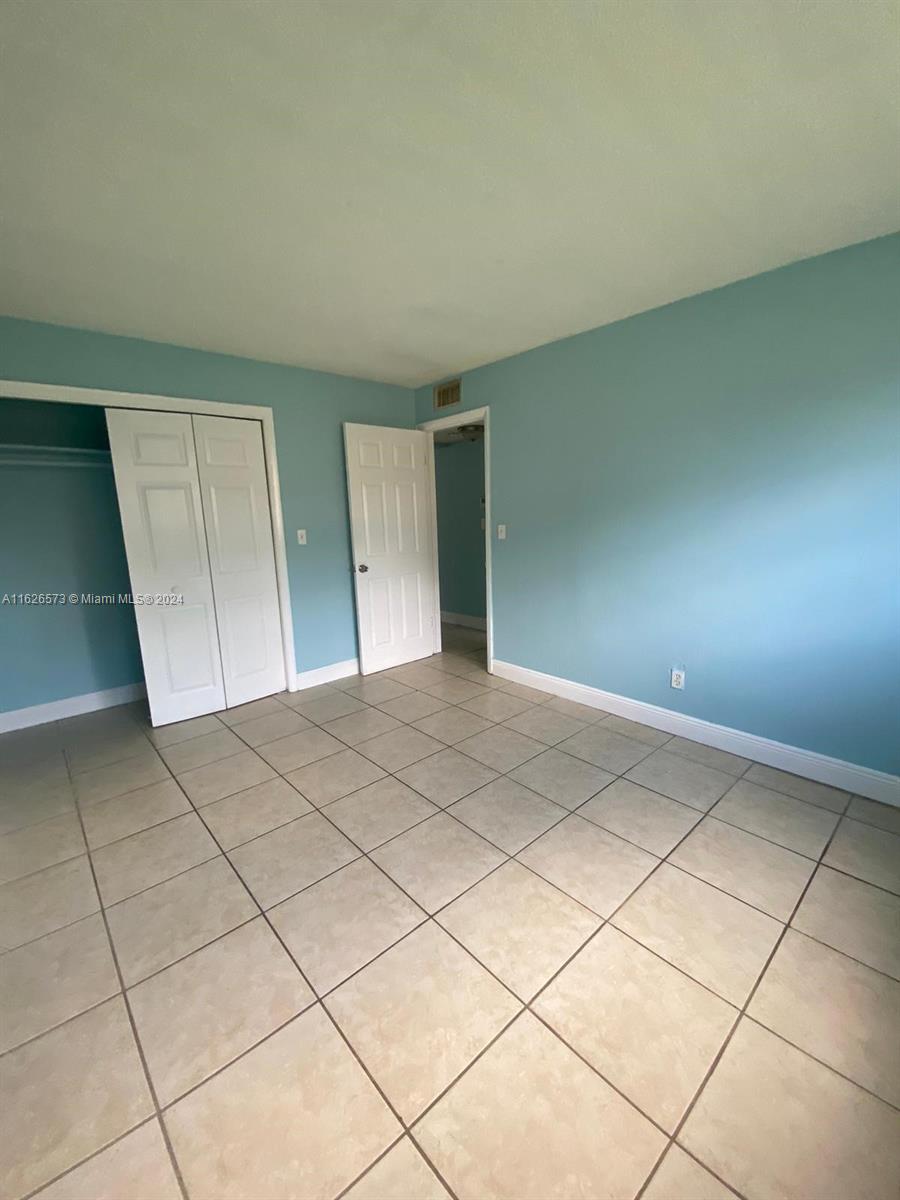 PALMS AT DANIA BEACH COND - Residential Lease