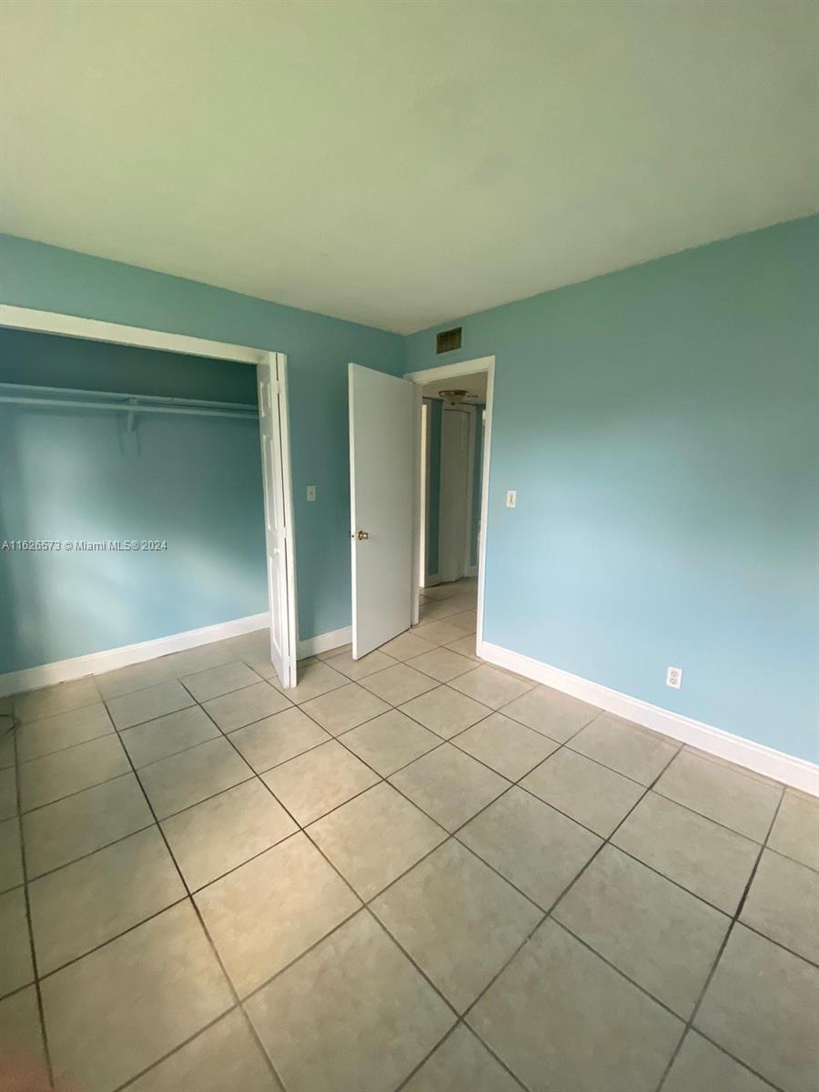 PALMS AT DANIA BEACH COND - Residential Lease