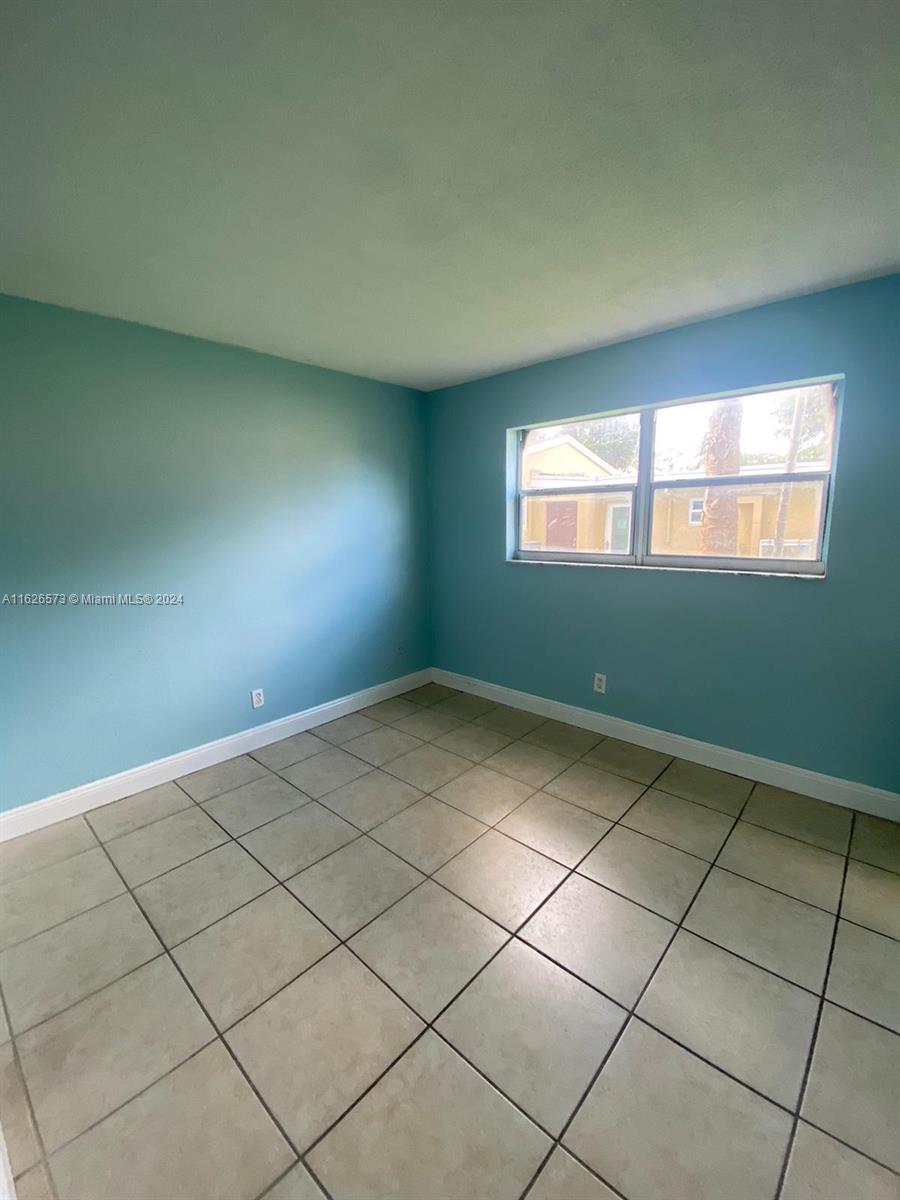 PALMS AT DANIA BEACH COND - Residential Lease