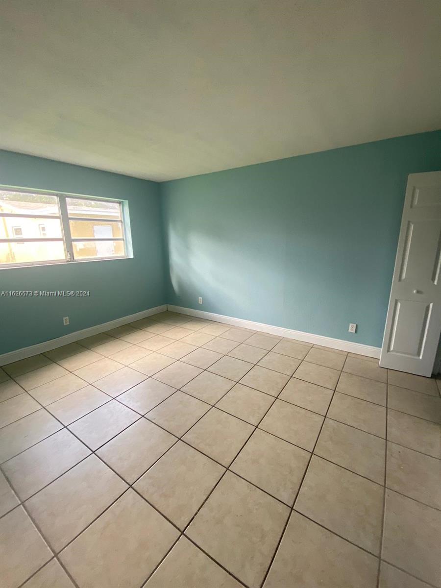 PALMS AT DANIA BEACH COND - Residential Lease