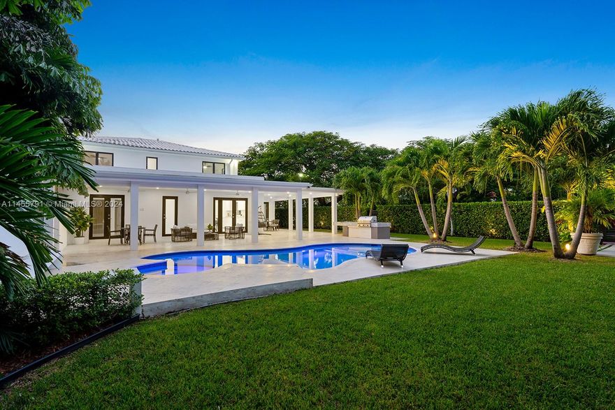 Modern on Meridian in the Heart of Miami Beach! Enjoy serene golf course sunset views from this completely renovated residence, situated on an oversized 11,400SF gated corner lot. Directly across from the MB Golf Course! Inside find 4BD, 3.5BA, light & bright interiors, elegant living spaces, fireplace, & an eat-in gas kitchen w/top-of-the-line Viking appliances. The primary suite offers a private terrace overlooking the golf course, walk-in closet, & a gorgeous bath w/dual sinks & steam rainshower. Entertain in style in the fenced & private backyard oasis w/covered loggia, summer kitchen, heated saltwater pool & spa. For added convenience enjoy 2 gated driveways w/parking for 6+ cars, laundry room w/sink, linear air diffusers, surround sound speakers, & A/C storage shed.