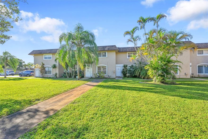 This charming 2-bedroom, 1.5-bath townhouse features a split-room floor plan with beautiful wood flooring throughout. The interior has been freshly painted and includes a modern kitchen equipped with stainless steel appliances. Enjoy outdoor living in the private, fenced backyard—perfect for pets or relaxing. Additional highlights include two-car parking and a layout ideal for comfortable, low-maintenance living.