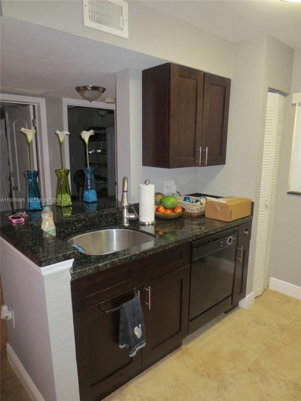 Photo of 2811 N Oakland Forest Dr #106, Oakland Park, FL 33309 (MLS # A11936995)