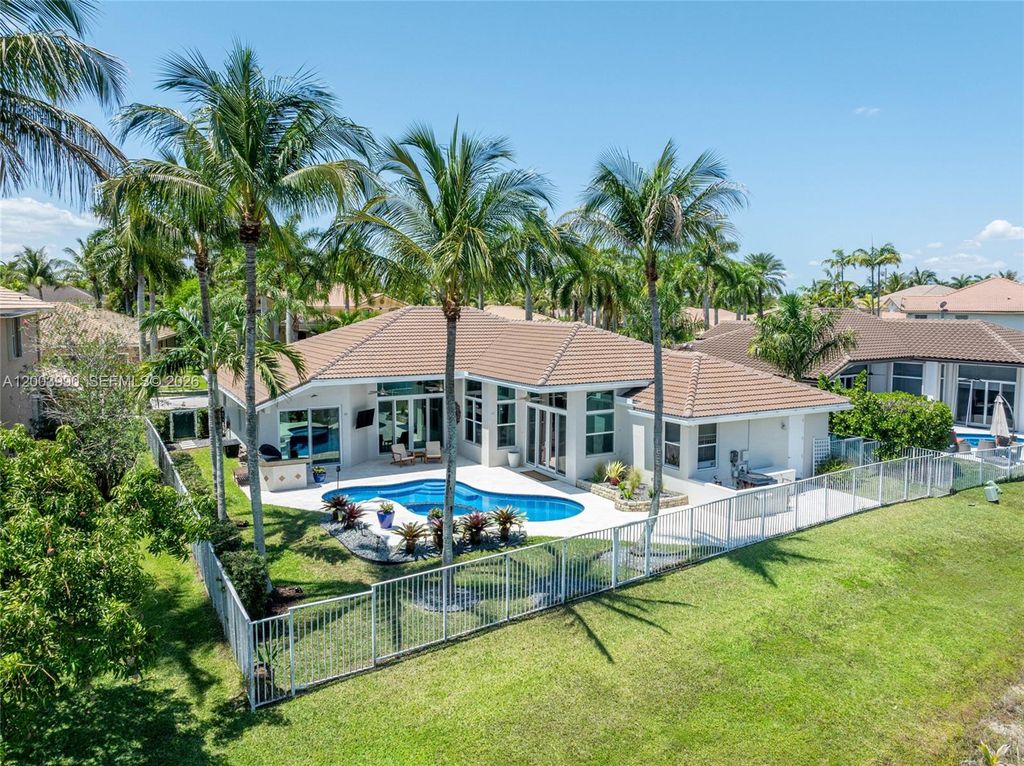 Photo of 1776 Victoria Pointe Cir, Weston, FL 33327 (MLS # A12003990)
