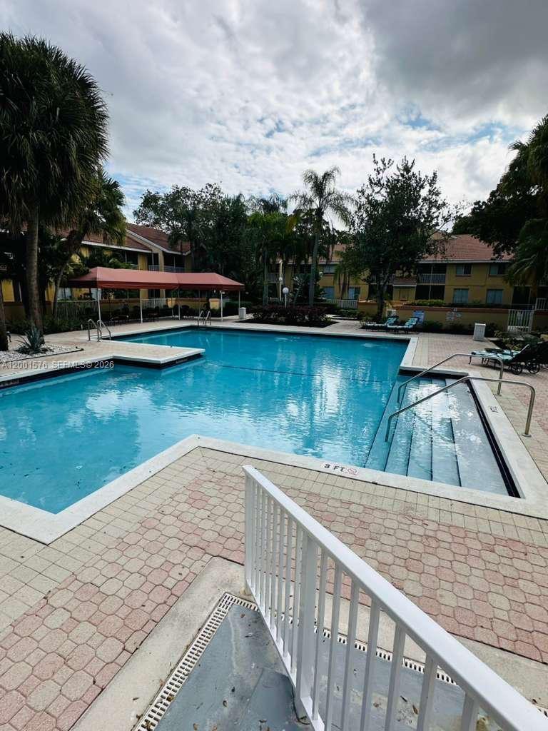 NAPOLI GARDENS AT CORAL S - Residential