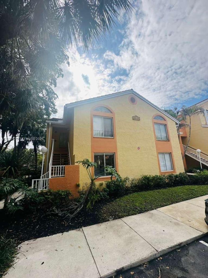 Beautifully updated 2-story, 2-bedroom, 2-bathroom condo located in the highly desirable Coral Springs area. This charming unit features ceramic tile flooring throughout, vaulted ceilings in the living area, and a bright, open layout freshly painted in neutral tones. The updated kitchen and renovated primary bathroom add a modern, move-in-ready feel, while both bedrooms offer spacious walk-in closets. Washer and dryer are conveniently located inside the unit, and both showers are being updated for added value.

Enjoy a private patio and screened porch overlooking the lush green views of Cypress Park, creating a peaceful and relaxing setting. Ideally situated just minutes from Coral Square Mall, shopping, dining, and major highways, this property offers both convenience and lifestyle.

The well-maintained community of Napoli Gardens features excellent amenities including a pool, spa/hot tub, tennis court, gym, business center, and clubhouse. Pet-friendly community with HOA covering roof, exterior painting, and landscaping. No special assessments.

Located in an A-rated school district, this property is perfect for homeowners looking to settle in before the new school year. Immediate rentals are allowed, making it an excellent opportunity for investors as well.