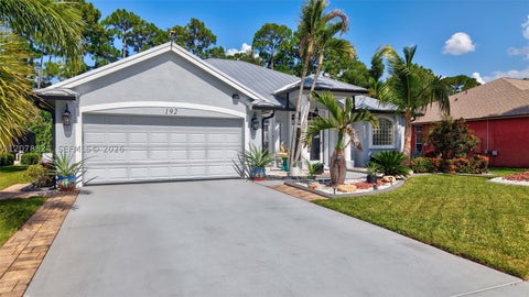 Photo of 192 SW Fernleaf Trl, Port St Lucie, FL 34953 (MLS # A12078524)
