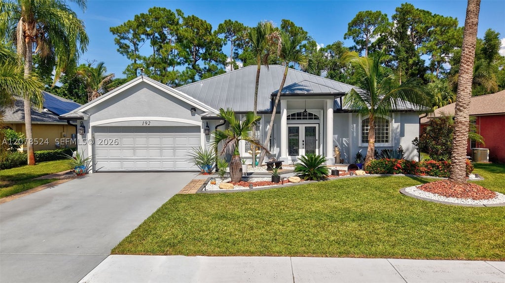 Photo of 192 SW Fernleaf Trl, Port St Lucie, FL 34953 (MLS # A12078524)