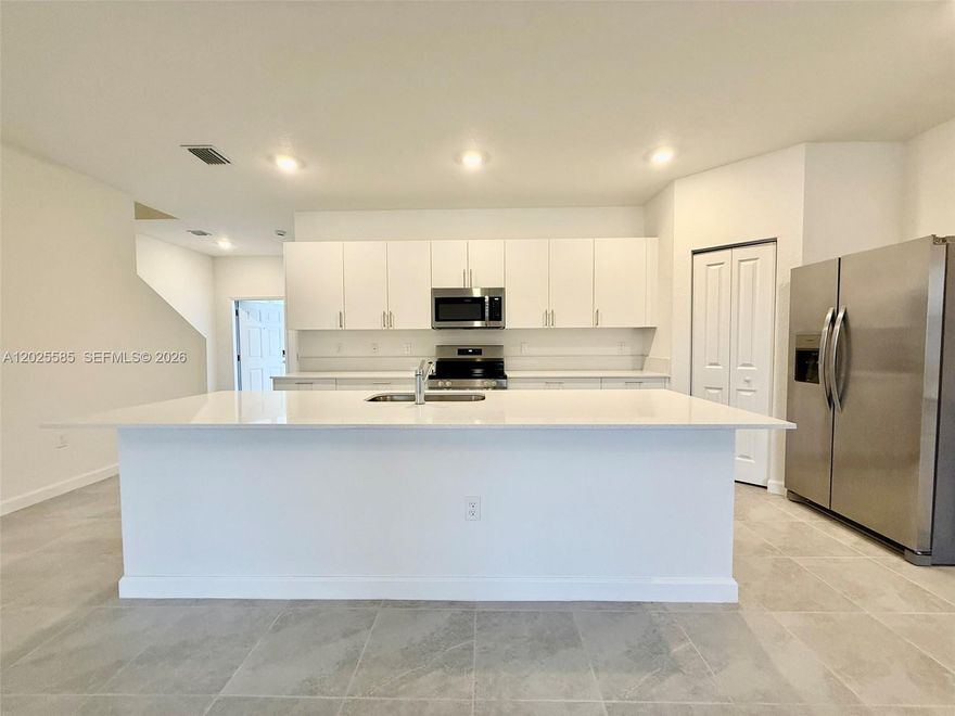 Brand new townhouse in the heart of Hollywood, built in 2025! 3 beds / 2 baths with 2 car garage. Featuring an open concept floor plan with an oversized kitchen and a large living area with natural light and modern finishes, Perfect for entertaining and everyday living. Beautiful turf back yard for perfect outdoor experience. Community offers clubhouse with a pool and fitness center, located minutes away from I95, best shopping centers, Hard Rock, Dania Pointe and restaurants. A must see!