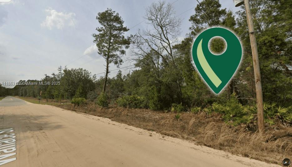 This 0.22-acre lot in Interlachen, Florida, is a flexible investment opportunity in a fast-growing area of Putnam County. Located in a peaceful, rural setting with easy access to nearby lakes and towns, the property is zoned R-2 Residential, allowing for various uses, including a mobile or container home, or RV parking, with no HOA. The level lot has direct road access and power nearby, making it easy to build. This is an ideal investment for personal use, a future home, or to hold for a family's financial future. With no credit checks or closing costs, acquiring the land is a straightforward process. Owner Financing That Works For You: 33% Down – Easy monthly terms (up to 36 months).
