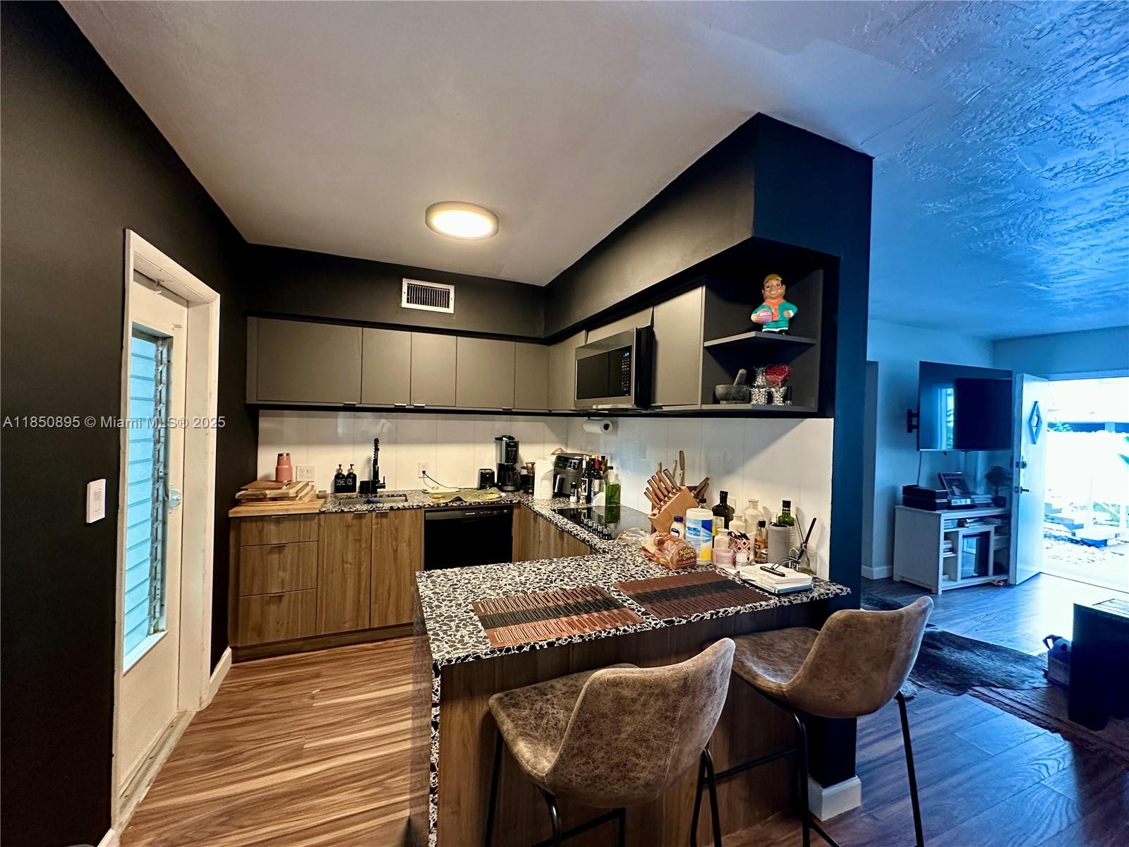 Charming and fully furnished 1BD/1BA in the heart of Bay Harbor Islands — vacant and ready for immediate move-in! Just half a mile from the beach and Bal Harbour Shops, this unit offers comfort, style, and convenience. Features include updated finishes, pet-friendly policy, and easy approval with no HOA. Includes assigned parking and access to great outdoor spaces including BBQ perfect for relaxing or entertaining. Located in a quiet community with friendly neighbors — ideal for anyone seeking a peaceful yet prime location!