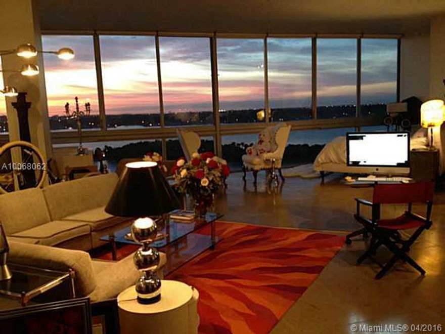 Exceptional Sunsets & Wide Open Bay views LOFT w/ wall to wall glass view to water. Residential building w/ modern industrial style construction, polished concrete floors, exposed ceiling, A/C ducts, & pipes, stainless appliances, washer/dryer, walk-in closets, 2 covered & gated parking spaces, rooftop pool & spa with 360 degrees views and gym. Unit is a 2 bd 2 bath LOFT style 11ft ceilings & open look with no walls enclosing the bedrooms. Unique find w/ open water views, square ft & modern at this price!