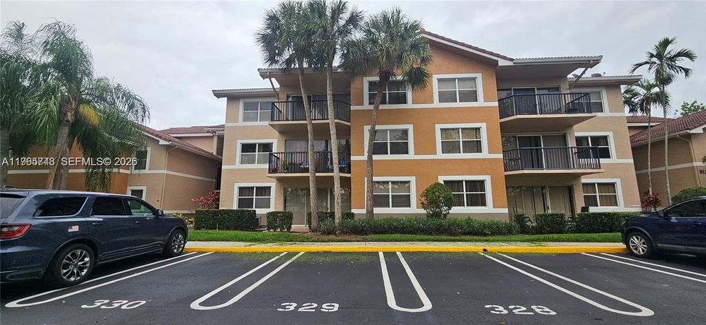 Photo of 9001 Wiles Rd #103-3, Coral Springs, FL 33067 (MLS # A11965748)