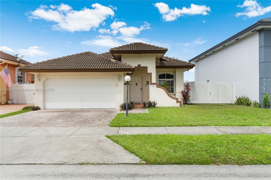 Discover this lakefront gem nestled in the heart of West Kendall! Located in the desirable Caribe Lakes community, this spacious one-story home sits on a 5,000 s/f lot and features a 2-car garage. With 4 bedrooms and 2 bathrooms in 2,147 total s/f, there’s plenty of room for the whole family. Enjoy peaceful water views right from your backyard—perfect for relaxing evenings or weekend get-togethers. The low HOA fee of just $115/month includes access to a rentable clubhouse, children's playground, basketball court, and scenic walking paths. Whether you're hosting friends or just unwinding, this home offers the space, serenity, and community amenities to match your lifestyle.